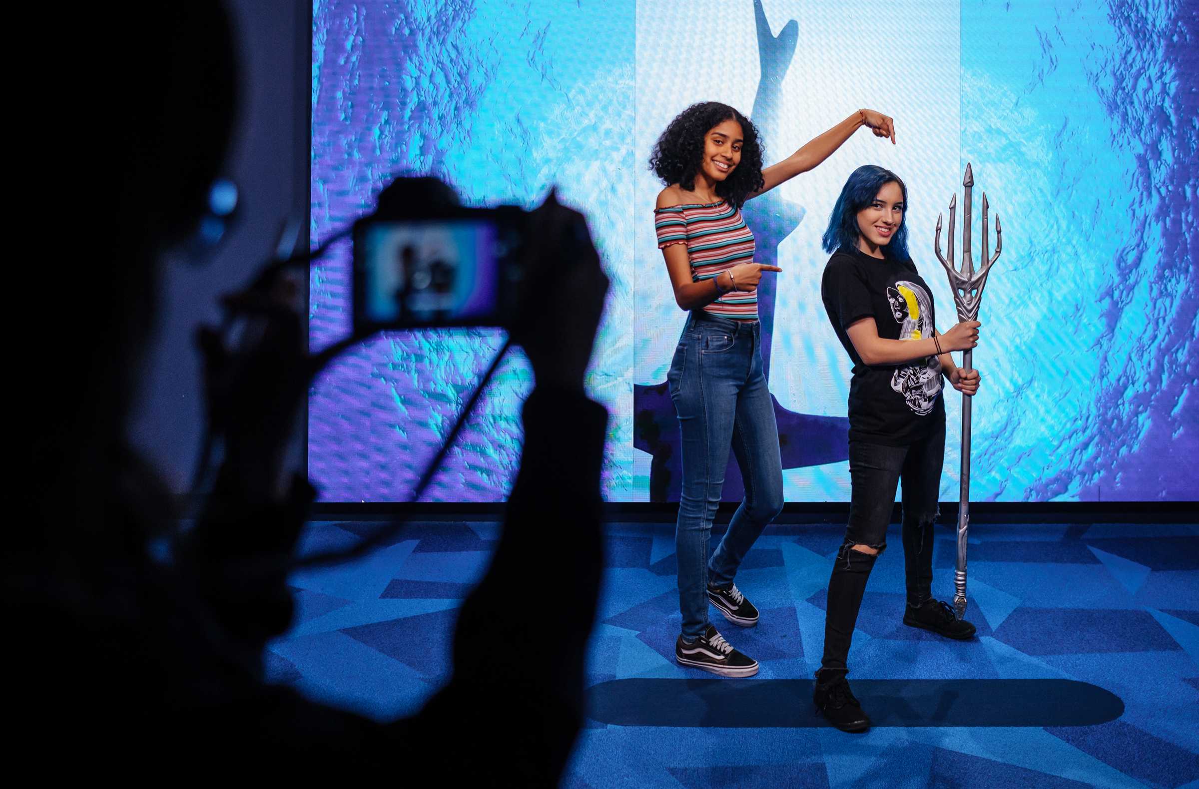 Guests having their photo taken at an attraction