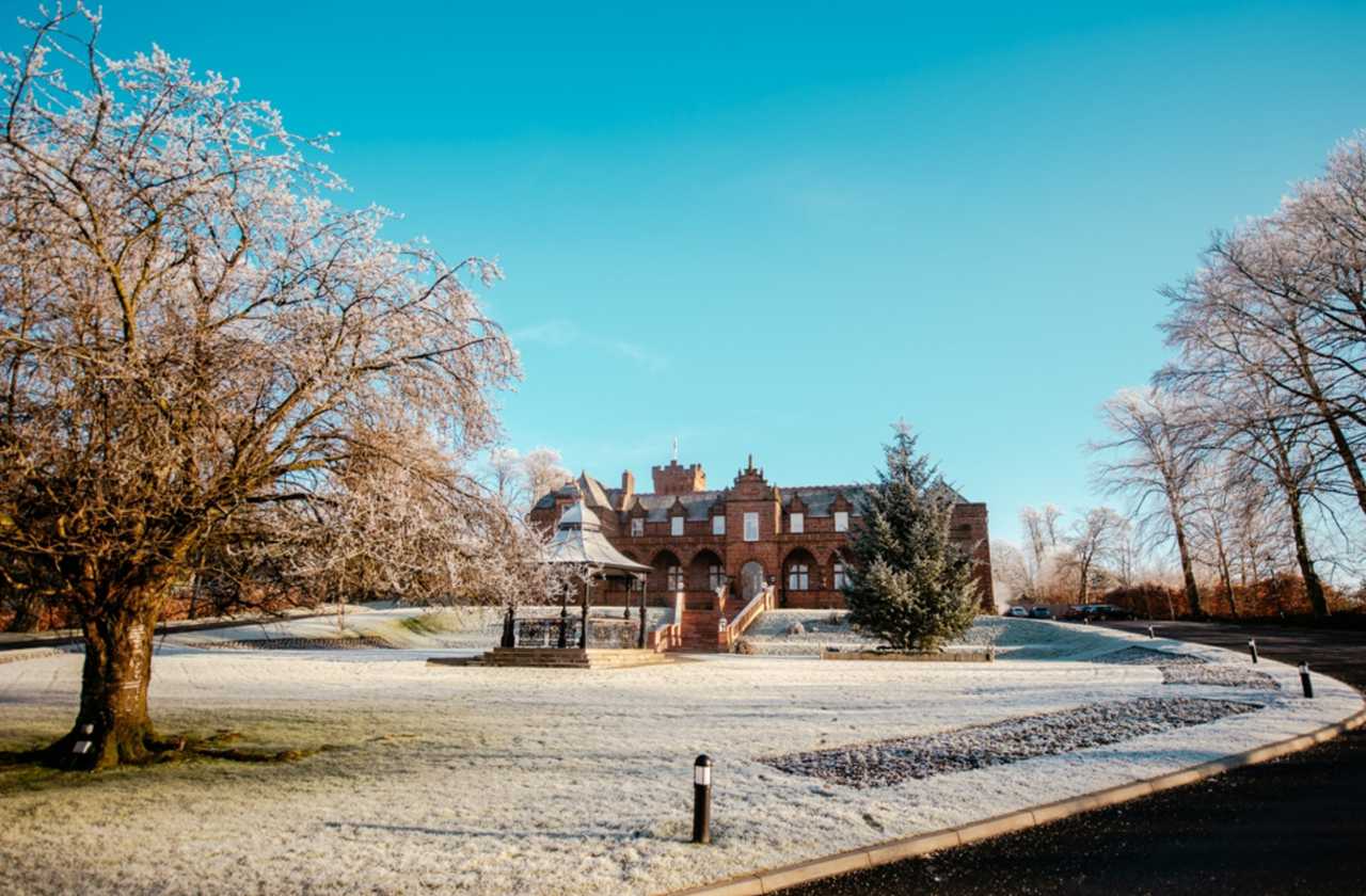 Hotel in winter with snow