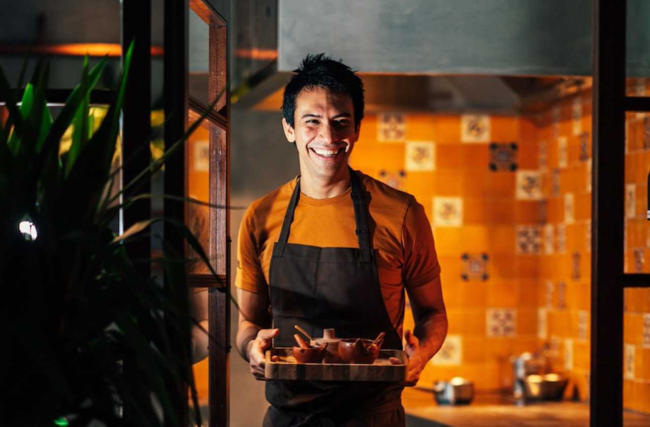 Waiter in an MJMK restaurant