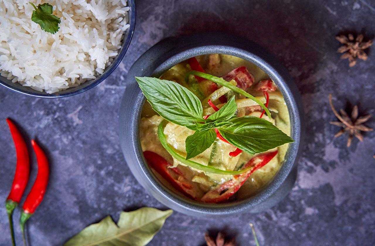 Bowls of Thai curry and rice