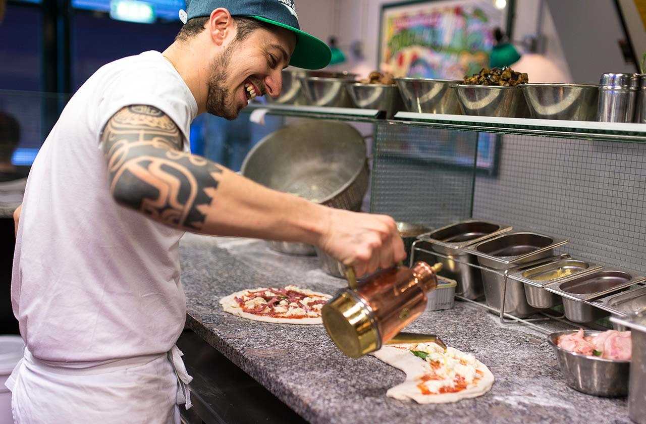 Chef preparing pizza